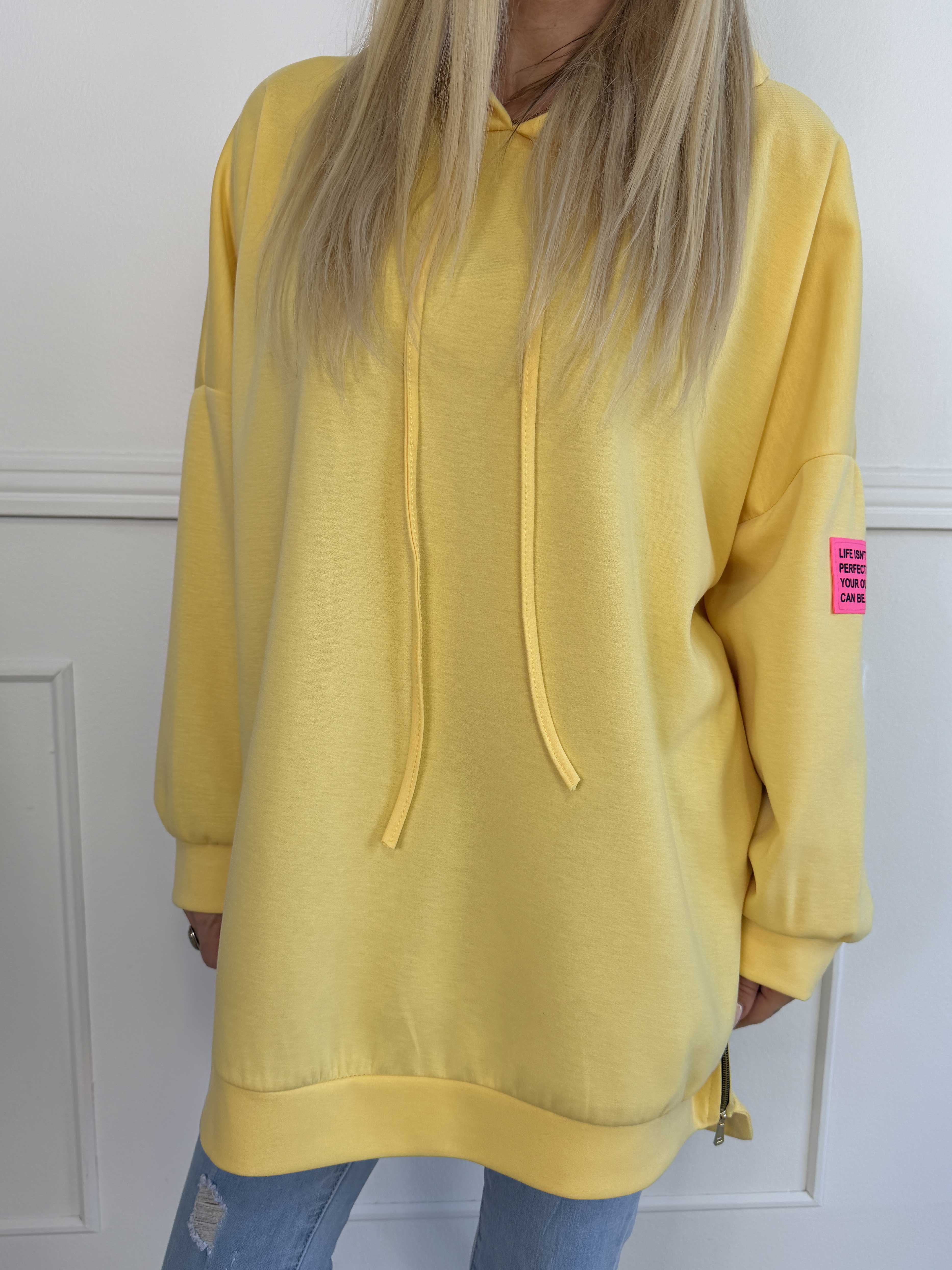 Victoria - Oversized hoodie med et pink mærke på ærmet